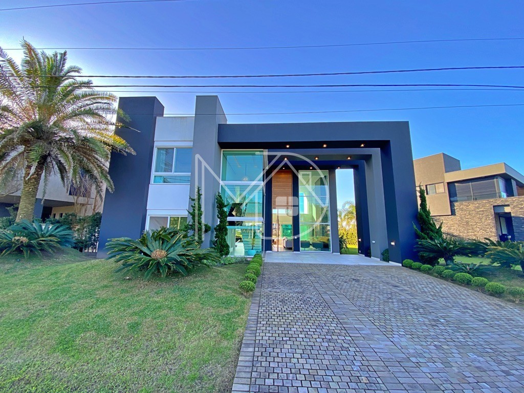 Imagem do imóvel Casa em condomínio 4 dormitórios para temporada, Centro em Xangri-lá referência 24